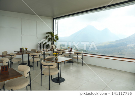 Inside a cafe with tables and mountain views in Kintamani Inside a cafe with tables and mountain views in Kintamani 141117756