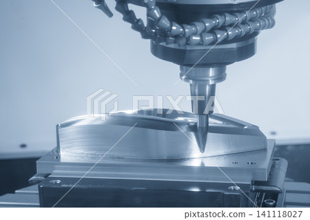 High-precision CNC milling machine performing a surface finishing process on mold parts with a barrel tool. High-precision CNC milling machine performing a surface finishing process on mold parts with a barrel tool. 141118027