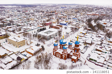 Aerial view of Church of the Intercession in winter in the city Petrovsk. Aerial view of Church of the Intercession in winter in the city Petrovsk. 141118051