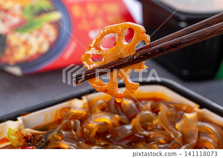 close-up of a self-heating spicy instant hot pot. close-up of a self-heating spicy instant hot pot. 141118073