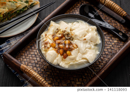 Chinese Silken Tofu Pudding, Traditional Doufunao Breakfast Snack Chinese Silken Tofu Pudding, Traditional Doufunao Breakfast Snack 141118093