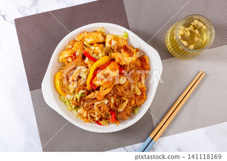 xinjiang Style Stir-Fried Rice Noodles with Chicken and Flatbread Cubes xinjiang Style Stir-Fried Rice Noodles with Chicken and Flatbread Cubes 141118169