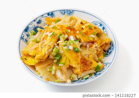 northeast Chinese street food grilled cold noodles with egg and scallions, isolated on white northeast Chinese street food grilled cold noodles with egg and scallions, isolated on white 141118227