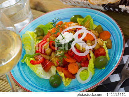 Tasty salad with baked vegetables Tasty salad with baked vegetables 141118351