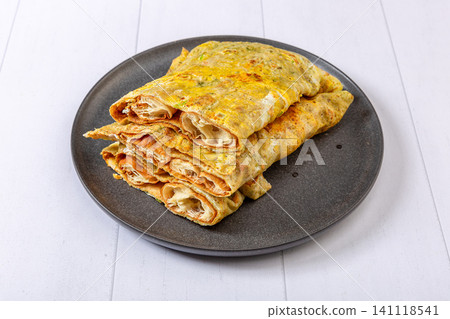 jianbing Chinese Savory Breakfast Crepe Traditional Street Food jianbing Chinese Savory Breakfast Crepe Traditional Street Food 141118541