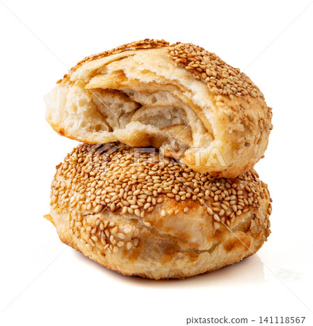 Chinese traditional baked shaobing flatbread with tahini sesame paste and white sesame seeds Chinese traditional baked shaobing flatbread with tahini sesame paste and white sesame seeds 141118567