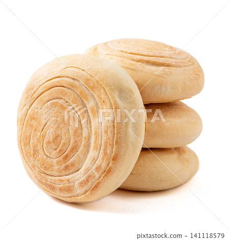 A stack of traditional Chinese Shaanxi style baked baijimo flatbread buns, isolated A stack of traditional Chinese Shaanxi style baked baijimo flatbread buns, isolated 141118579