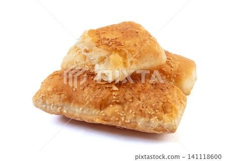 Chinese savory five spice crispy square shaobing flatbread with sesame seeds, isolated Chinese savory five spice crispy square shaobing flatbread with sesame seeds, isolated 141118600
