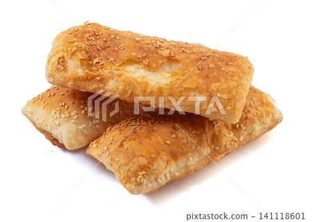 Chinese savory five spice crispy square shaobing flatbread with sesame seeds, isolated Chinese savory five spice crispy square shaobing flatbread with sesame seeds, isolated 141118601