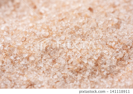 Pale pink Himalayan rock salt crystals and fine grains Pale pink Himalayan rock salt crystals and fine grains 141118911