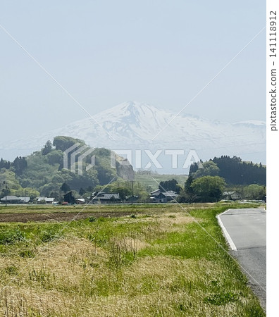 A quintessential Japanese landscape overlooking snow-capped mountains A quintessential Japanese landscape overlooking snow-capped mountains 141118912