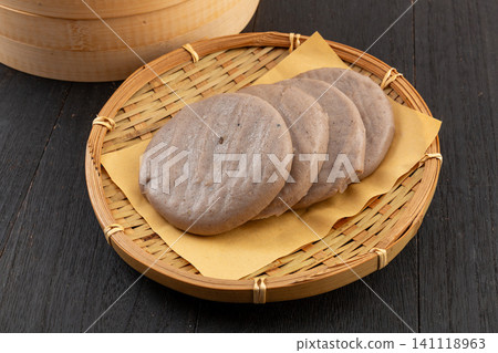 Traditional Chinese Buckwheat Cakes, Raw Ingredient for Pagao on Bamboo Basket Traditional Chinese Buckwheat Cakes, Raw Ingredient for Pagao on Bamboo Basket 141118963