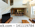 A modern living and dining room with a high ceiling. 141119784
