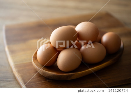 Fresh eggs on the table Fresh eggs on the table 141120724