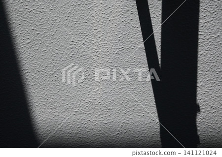 A mortar wall in shadow A mortar wall in shadow 141121024