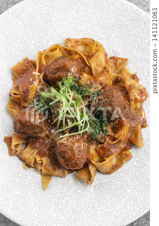 Polpette In Sugo meatballs in tomato sauce with Pappardelle pasta Polpette In Sugo meatballs in tomato sauce with Pappardelle pasta 141121061