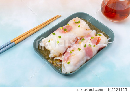 Steamed rice noodle rolls with Chinese sausage slices on plate Steamed rice noodle rolls with Chinese sausage slices on plate 141121125