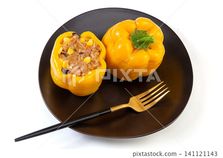 homemade stuffed bell peppers with rice and minced meat served on a plate. homemade stuffed bell peppers with rice and minced meat served on a plate. 141121143