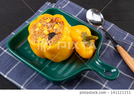 healthy delicious stuffed sweet peppers with savory rice filling, close up. healthy delicious stuffed sweet peppers with savory rice filling, close up. 141121151