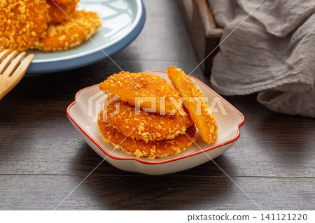 authentic Chinese Nanguabing, fried sticky rice pumpkin cakes with breadcrumbs. authentic Chinese Nanguabing, fried sticky rice pumpkin cakes with breadcrumbs. 141121220