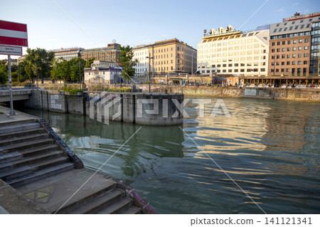 Vienna, Austria - June 13, 2023: Embankment the Danube Canal in Vienna Vienna, Austria - June 13, 2023: Embankment the Danube Canal in Vienna 141121341