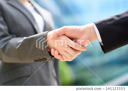 The hands of Asian businesspeople shaking hands The hands of Asian businesspeople shaking hands 141121553