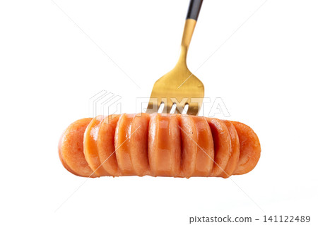 close-up of Juicy Grilled Spiral Cut Pork Sausage on Gold Fork Isolated on White Background close-up of Juicy Grilled Spiral Cut Pork Sausage on Gold Fork Isolated on White Background 141122489