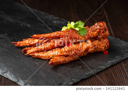 jiangxi Style Spicy Braised Chicken Feet Hot Chili Marinated Poultry Claws Asian Dim Sum jiangxi Style Spicy Braised Chicken Feet Hot Chili Marinated Poultry Claws Asian Dim Sum 141122641