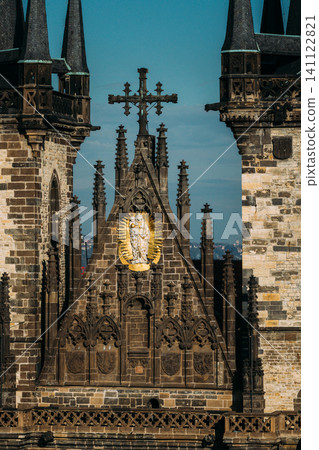 Golden statue detail on the facade of the Church of Our Lady before Tyn. 141122821