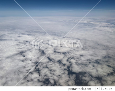 Aerial view of sea of clouds and cirrocumulus clouds over Hokkaido. Aerial view of sea of clouds and cirrocumulus clouds over Hokkaido. 141123046