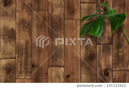 復古風格的再生木材和龜背竹植物背景。 復古風格的再生木材和龜背竹植物背景。 141123922