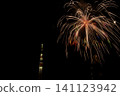 The moon, Tokyo Skytree, and the fireworks display at the Sumida River Fireworks Festival 141123942