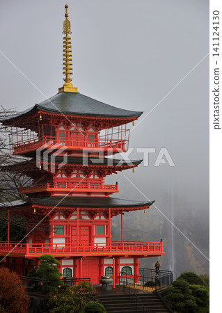 A three-story pagoda shrouded in mist 141124130