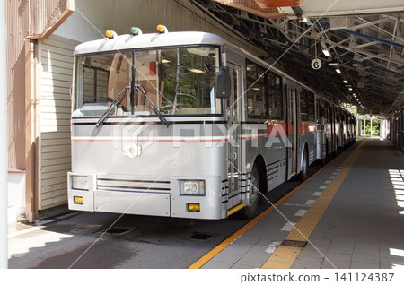 Bus parked at the bus terminal Bus parked at the bus terminal 141124387