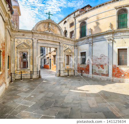 Amazing  cityscape of Venice with narrow canals, boats and gondolas and bridges with traditional buildings. 141125634