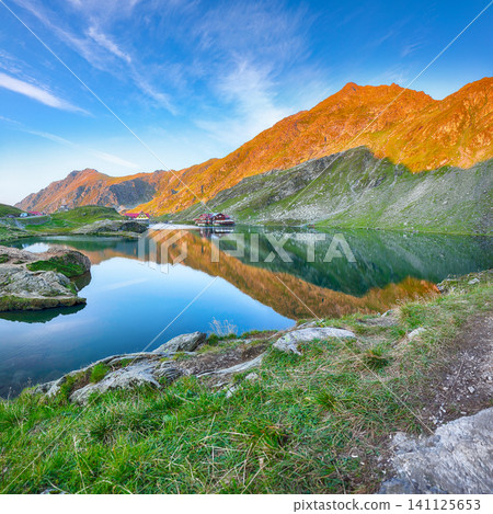 Amazing sunset view of Balea glacier lake near the Transfagarasan road. Amazing sunset view of Balea glacier lake near the Transfagarasan road. 141125653