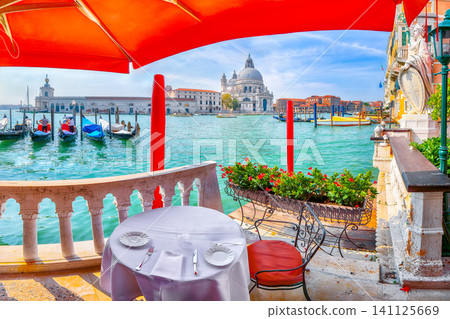 Remarkable  morning cityscape of Venice with famous Canal Grande and Basilica di Santa Maria della Salute church. 141125669