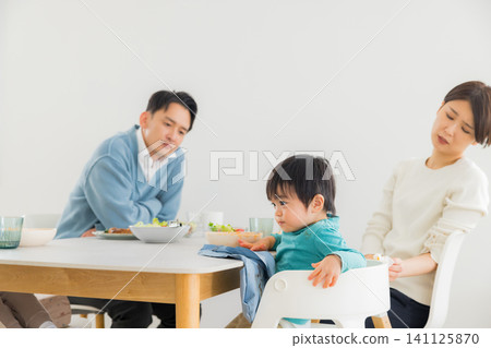 Family eating at the dining table Family eating at the dining table 141125870
