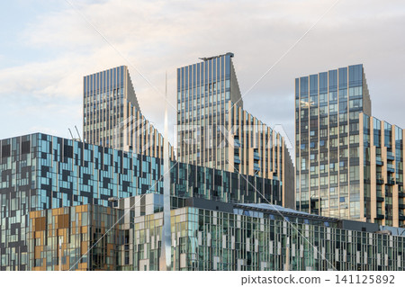 High rise residential buildings in London with unique geometric facade design High rise residential buildings in London with unique geometric facade design 141125892