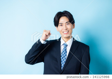 A man in a suit A man in a suit 141125998