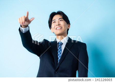 A man in a suit A man in a suit 141126003