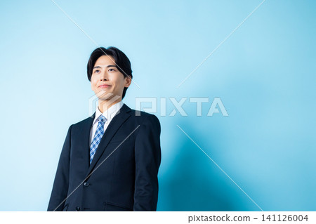 A man in a suit A man in a suit 141126004