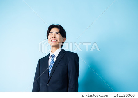 A man in a suit A man in a suit 141126006