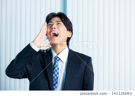 Businessman with arms folded 141126063