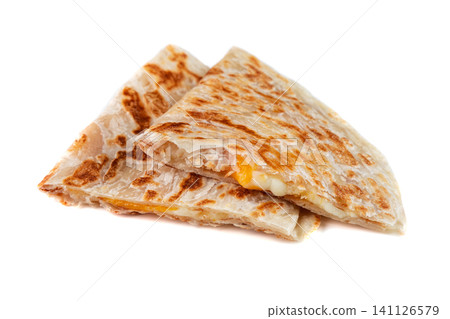 Delicious quesadilla with melted cheese side view close up on white background with copy space savory mexican snack food for take out or delivery Delicious quesadilla with melted cheese side view close up on white background with copy space savory mexican snack food for take out or delivery 141126579