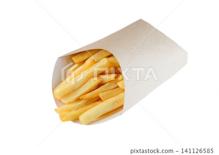 Crispy golden french fry in craft paper pocket on white background side view close up with copy space delicious savory junk food snack for menu 141126585