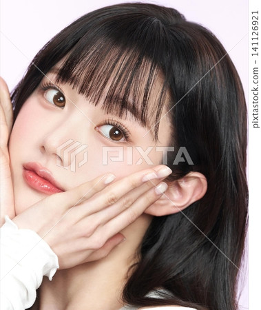 Beautiful Young Asian Woman with Natural Healthy Glowing Skin and Smooth Black Hair, Fresh Beauty Portrait on Clean Background Beautiful Young Asian Woman with Natural Healthy Glowing Skin and Smooth Black Hair, Fresh Beauty Portrait on Clean Background 141126921