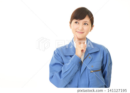 Female worker smiling Female worker smiling 141127195