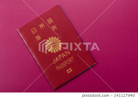 Japanese passport or id document with tickets for flight, travel, border crossing. Japan passport Japanese passport or id document with tickets for flight, travel, border crossing. Japan passport 141127940