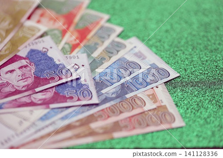 Pakistan rupees banknotes on glitter green background. The current Pakistan money bills Pakistan rupees banknotes on glitter green background. The current Pakistan money bills 141128336
